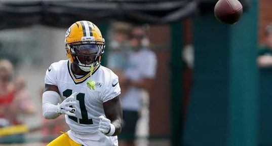 Green Bay Packers wide receiver Jayden Reed (11) catches a pass during the first day of training camp.