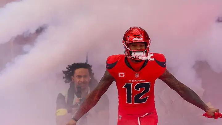 Houston Texans wide receiver Nico Collins (12) is introduced before playing against the Las Vegas Raiders at NRG Stadium.